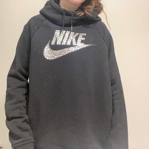 NIKE black hoodie with speckled check mark